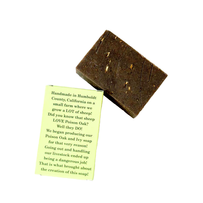 Handcrafted dark brown soap bar made with essential oils, herbal extracts, and organic oat bran in a glycerin base, offering natural relief for skin irritations, featured in Health & Wellness, Soaps and Soapmaking, USA Made, Best Sellers, and Promo Eligible collections.