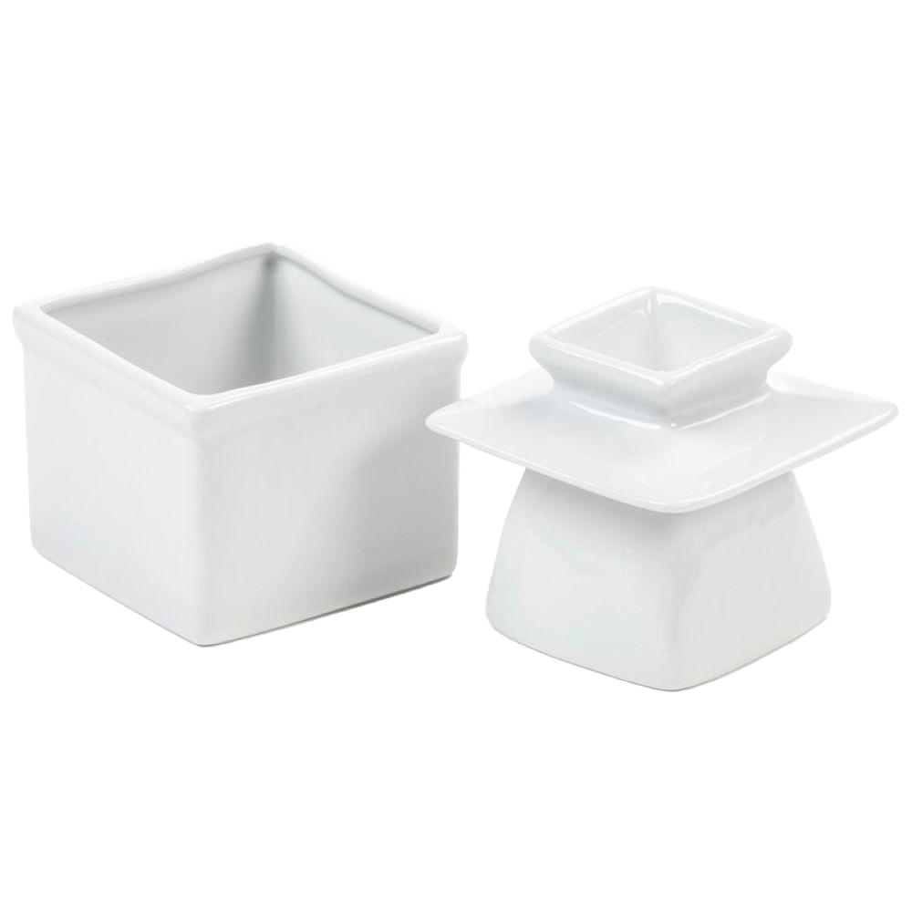 White porcelain butter keeper with separate lid designed to keep butter soft at room temperature, handcrafted piece ideal for kitchen, specialty equipment, and storage use.