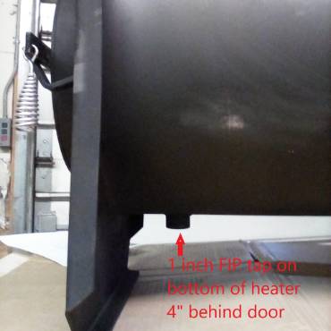 Close-up view of the lower section of a handcrafted Amish made, thick welded steel wood-fired water heater showing a 1-inch FIP tap located 4 inches behind the door, featured in Appliances, USA Made, and Water Heating and Treatment collections.