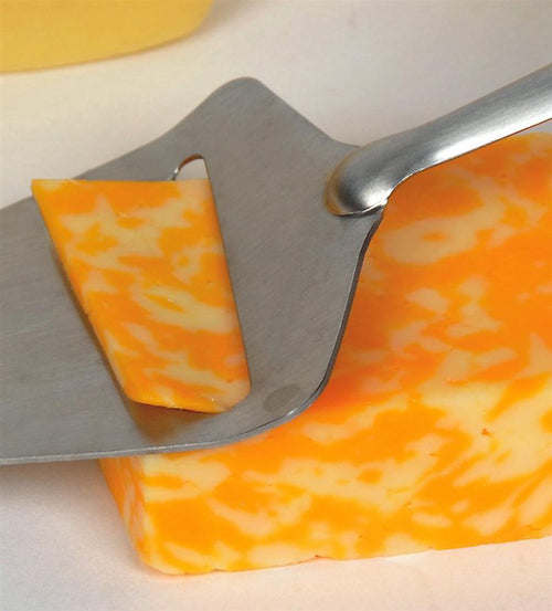 Stainless steel blade cheese slicer with wooden handle cutting a thin slice of marbled cheddar, ideal for Kitchen & Food, Specialty Equipment, and DIY Cheese collections.