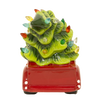 Handcrafted dolomite red truck carrying a vibrant green Christmas tree decorated with colorful LED lights, battery operated, perfect for Home & Decor, Holiday Decor, Best Sellers, and Promo Eligible collections.