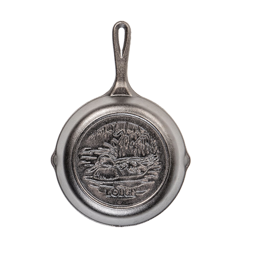 Cast iron skillet featuring a detailed Mallard duck design in the center, crafted from heavy cast iron, part of Kitchen & Food, Cookware, Cast Iron, USA Made, Best Sellers, and Promo Eligible collections.