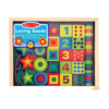Colorful handcrafted wooden lacing beads in various shapes and numbers, with two laces, designed to enhance fine motor skills in children's indoor play and wooden toys collections.