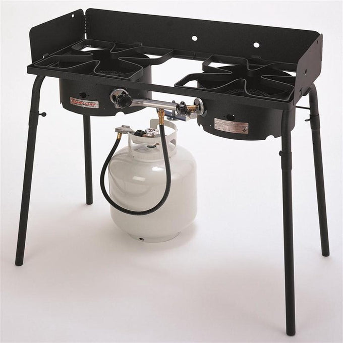 Black metal double burner propane cooker with removable legs and adjustable burners connected to a white LP tank, ideal for outdoor use in Farm, Garden & Tool, Camping, Emergency Supplies, Best Sellers, and Promo Eligible collections.