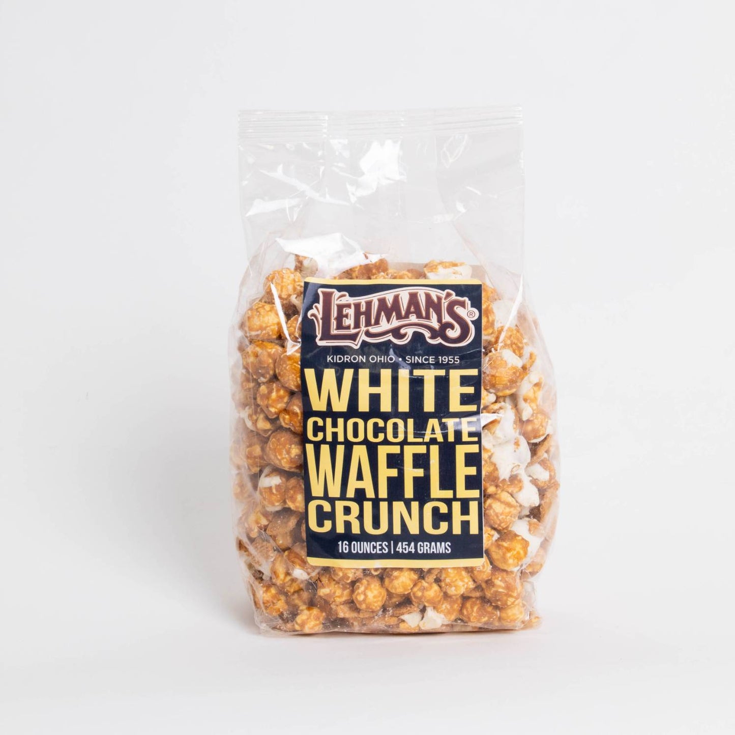 Clear bag of handcrafted white chocolate waffle crunch popcorn, a sweet and crunchy snack made in USA, featured in Kitchen & Food, Snacks and Sweets, Popcorn, USA Made, and Best Sellers collections.
