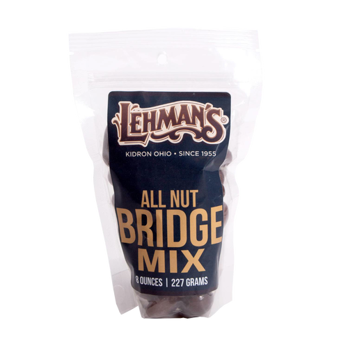 Resealable bag of Lehman's all nut bridge mix featuring milk chocolate coated cashews, almonds, pecans, and Brazil nuts, made in USA, ideal for Kitchen & Food, Snacks and Sweets, Candy, Best Sellers, and Promo Eligible collections.