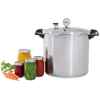 Large silver-toned pressure canner with black handles and a built-in pressure gauge, accompanied by assorted jars of preserved vegetables and fresh carrots, featured in Kitchen & Food, Food Preservation, and Canning collections.