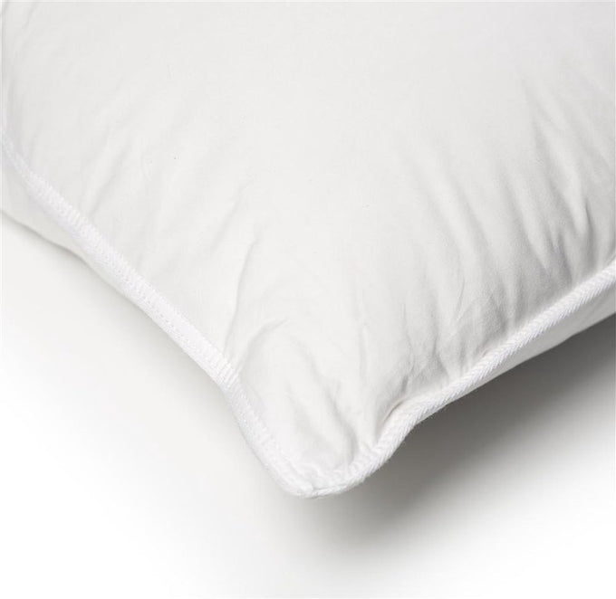 Handcrafted layered pillow featuring an inner core of firm white duck feathers and soft outer down layers, designed for comfort and support in Home & Decor and Best Sellers collections.