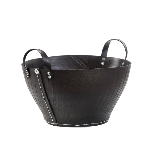 Handcrafted heavy-duty firewood basket made from recycled rubber with reinforced metal rivet handles, perfect for Farm, Garden & Tool and Wood Cutting and Hauling collections.