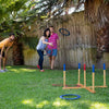 Group of three adults playing giant ring toss lawn game with wooden frame and colorful rings on a sunny backyard, included in Toys, Books & Games and Best Sellers collections