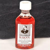 Handcrafted glass bottle of reddish liniment for hand and muscle pain relief, made in USA, featured in Health & Wellness, Health Remedies, Best Sellers, and Promo Eligible collections.