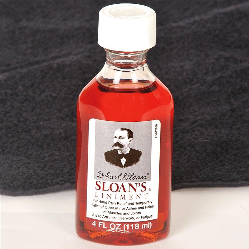 Handcrafted glass bottle of reddish liniment for hand and muscle pain relief, made in USA, featured in Health & Wellness, Health Remedies, Best Sellers, and Promo Eligible collections.