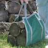 Handcrafted green nylon canvas firewood carrier with sturdy gray straps, designed to easily haul multiple logs, perfect for Farm, Garden & Tool, Stoves, Wood Cutting and Hauling, USA Made, Amish Made, and Hearth Accessories collections.