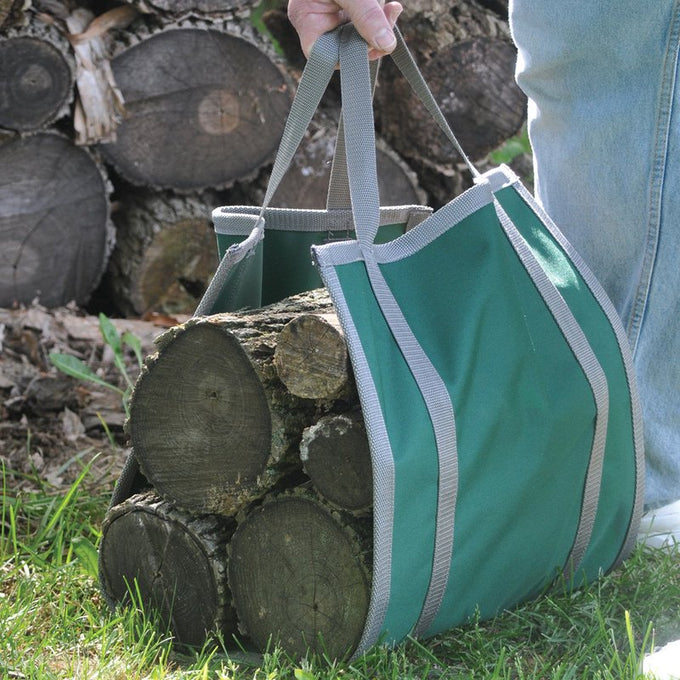 Handcrafted green nylon canvas firewood carrier with sturdy gray straps, designed to easily haul multiple logs, perfect for Farm, Garden & Tool, Stoves, Wood Cutting and Hauling, USA Made, Amish Made, and Hearth Accessories collections.