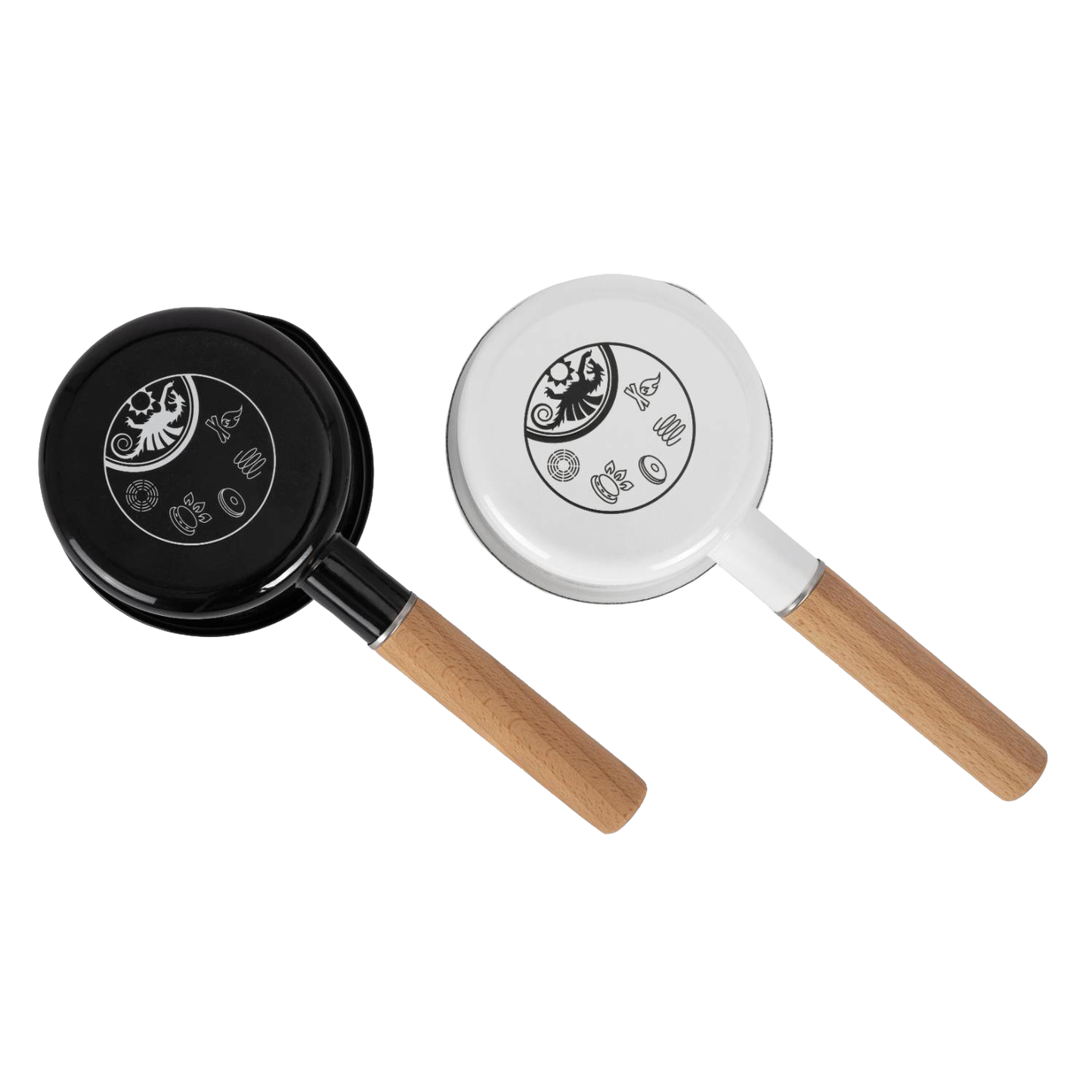Two Petromax enamel pans for outdoor cooking in black and white, each featuring a wooden handle and decorative symbols on the base, perfect for camping and cookware collections.