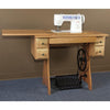 Traditional sewing machine set in a handcrafted wooden cabinet with drawers and a foot-powered treadle, perfect for Home & Decor and Sewing and Quilting collections.