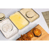 Three attachable stainless steel trays arranged with flour, beaten egg, and breadcrumbs for a no-mess breading process, shown with breaded eggplant and chicken pieces, ideal for Kitchen & Food and Cookware collections.