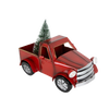 Red metal vintage-style truck decoration with a small green Christmas tree in the bed, featuring battery-operated lights, perfect for holiday decor and home accents.