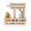 Handcrafted small nativity display with a simple wooden stable and attached resin figurines of Mary, Joseph, and baby Jesus, designed for Home & Decor and Holiday Decor collections.