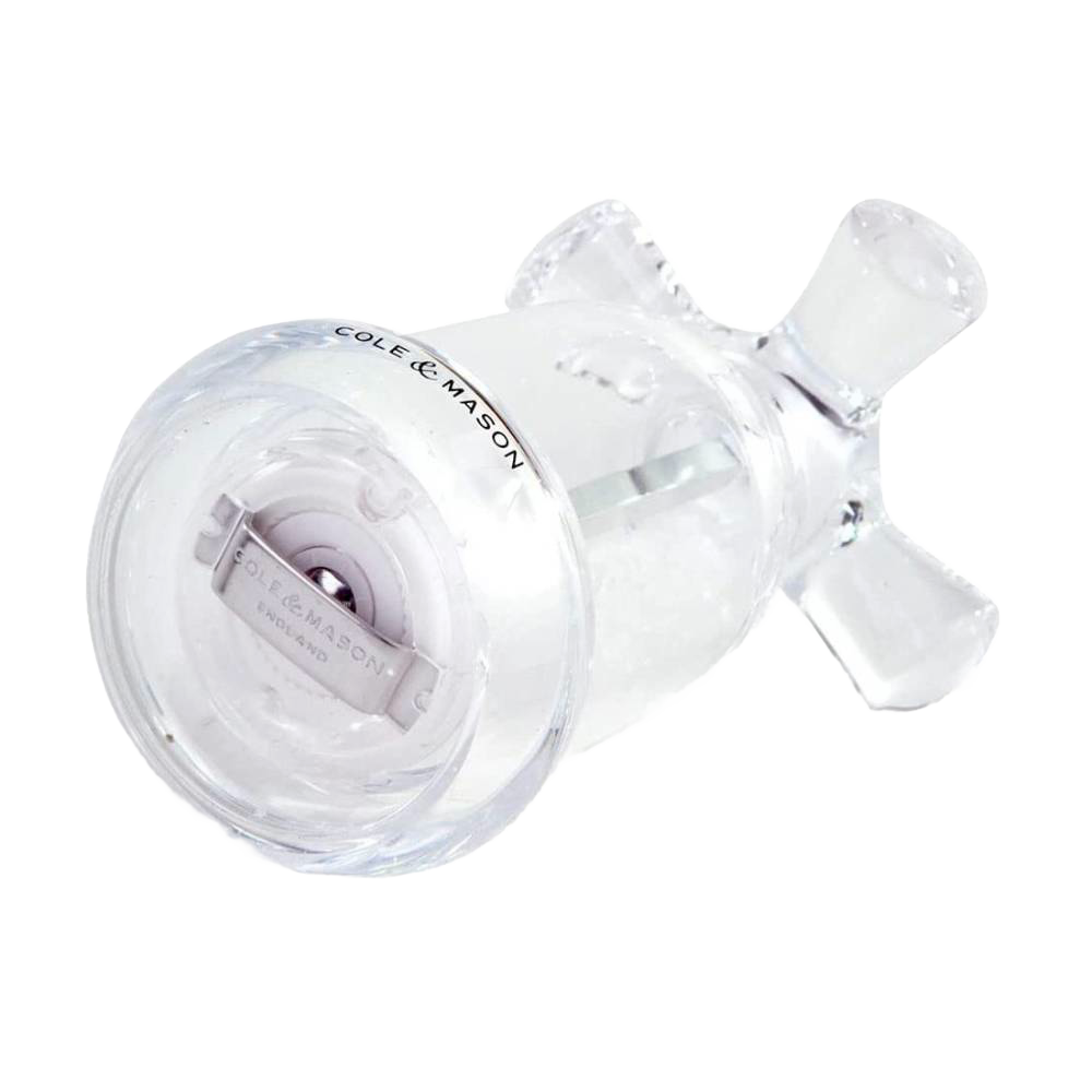 Clear acrylic salt mill shaped like a vintage faucet handle with visible sea salt inside, crafted for Kitchen & Food, Dinnerware, Storage and Serving, Best Sellers, and Promo Eligible collections.