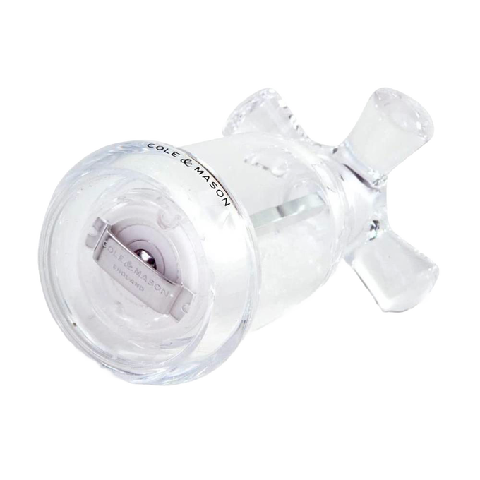 Clear acrylic salt mill shaped like a vintage faucet handle with visible sea salt inside, crafted for Kitchen & Food, Dinnerware, Storage and Serving, Best Sellers, and Promo Eligible collections.