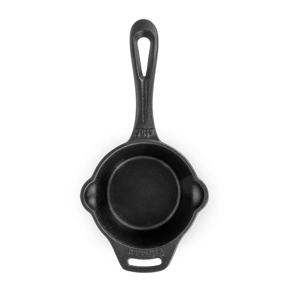 Top view of a black cast iron sauce pot with long handle and side grip loops, designed for making sauces, roux, and brown butter; ideal for Farm, Garden & Tool, Kitchen & Food, Camping, Cookware, Cast Iron, and Best Sellers collections.