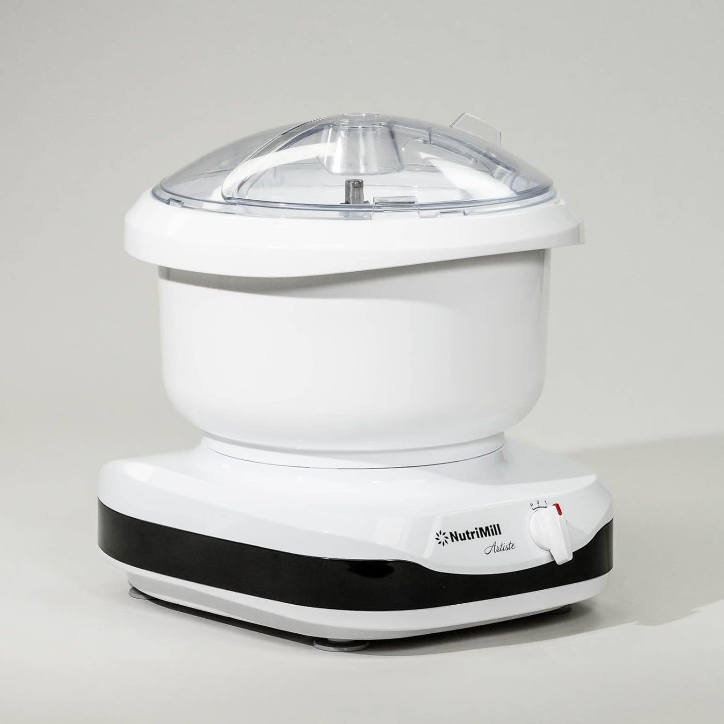 Compact white kitchen mixer with black base and clear plastic lid, featuring a control knob, designed for versatile baking tasks in Kitchen & Food and Baking Supplies collections.