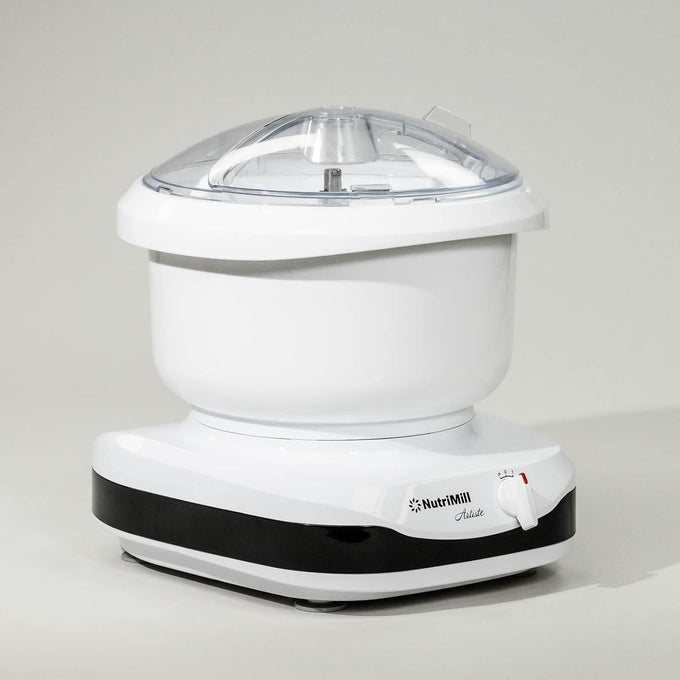 Compact white kitchen mixer with black base and clear plastic lid, featuring a control knob, designed for versatile baking tasks in Kitchen & Food and Baking Supplies collections.