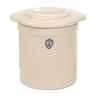 Cream-colored stoneware crock lid with raised center, handcrafted in the USA, designed for food preservation and fermenting in kitchen and pickling collections.