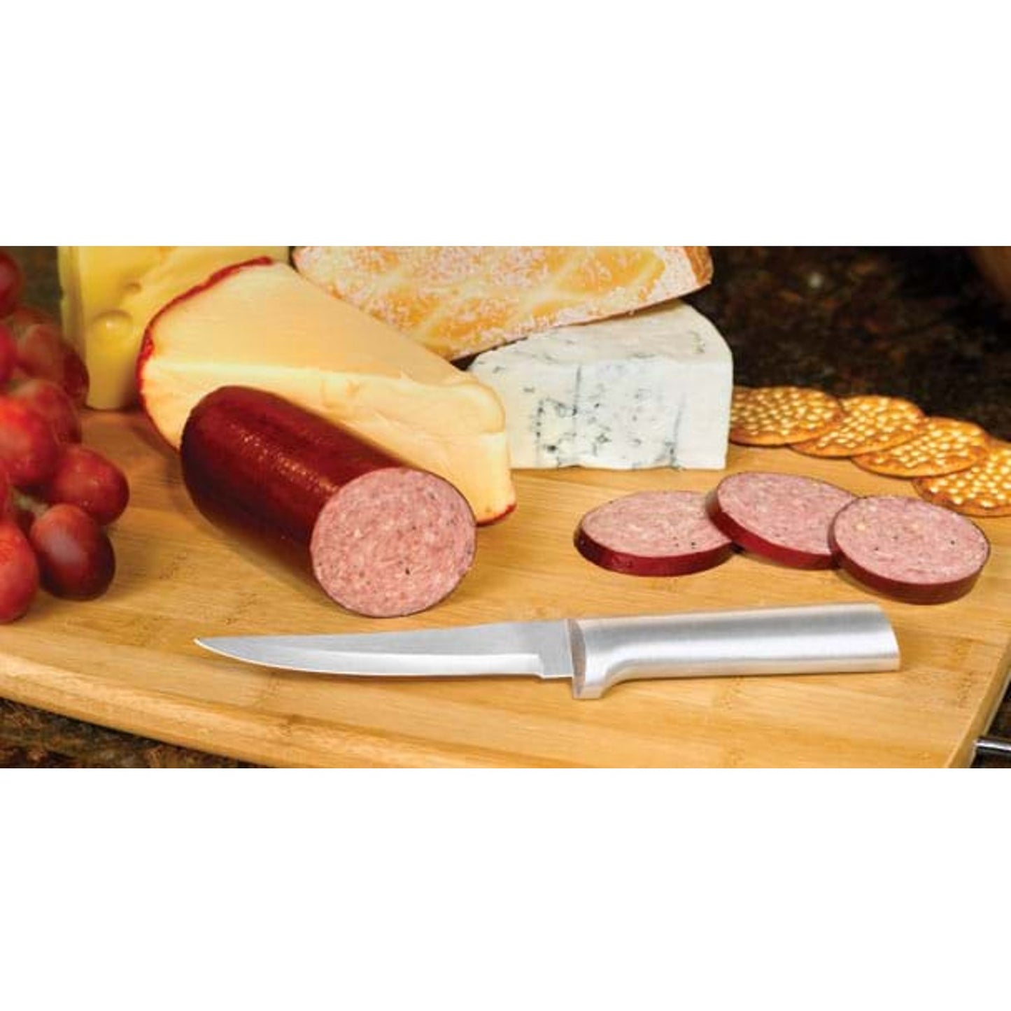 Handcrafted Rada Super Parer with high carbon surgical stainless steel blade and solid aluminum handle, slicing sausage on a wooden board with cheese, crackers, and grapes in Farm, Garden & Tool and Kitchen & Food collections.