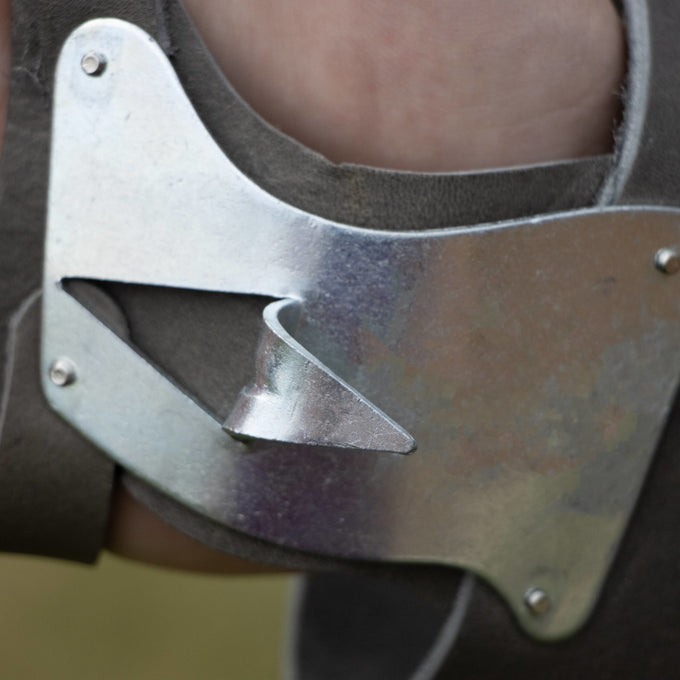 Close-up of galvanized steel hook attached to leather palm pad and double wrist strap, designed for efficient corn husking, part of Farm, Garden & Tool and USA Made collections.