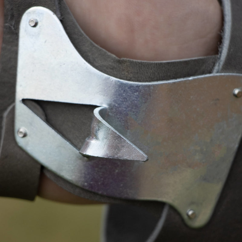 Close-up of galvanized steel hook attached to leather palm pad and double wrist strap, designed for efficient corn husking, part of Farm, Garden & Tool and USA Made collections.