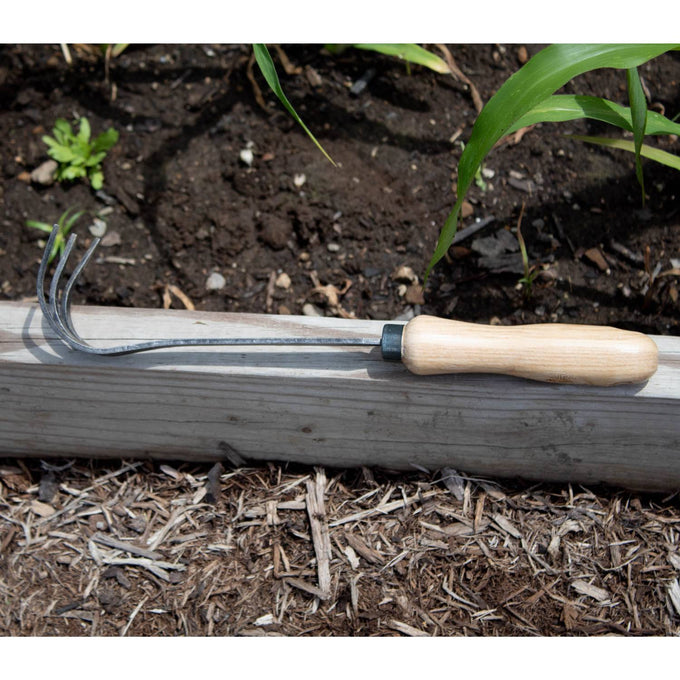 Handcrafted garden cultivator with a durable three-tine steel head and smooth wooden handle, designed for precise soil aeration in Farm, Garden & Tool, Digging and Cultivating, Garden Accessories, Best Sellers, and Promo Eligible collections.