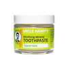 Handcrafted small glass jar of spearmint alkalizing mineral toothpaste with a white lid and bright green label, featured in Health & Wellness, Grooming and Personal Hygiene, USA Made, and Best Sellers collections.
