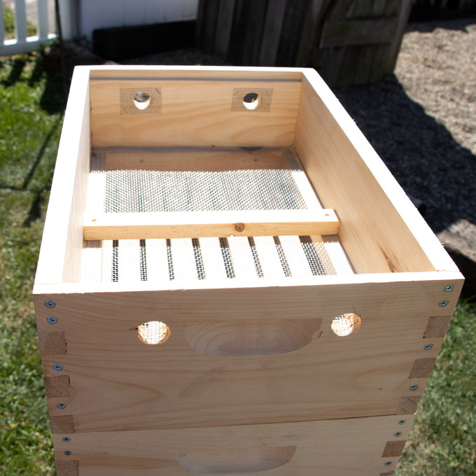 Handcrafted Amish made wooden 8-frame quilt box with mesh bottom and ventilation holes for moisture control in beekeeping, featured in Farm, Garden & Tool and USA Made collections.