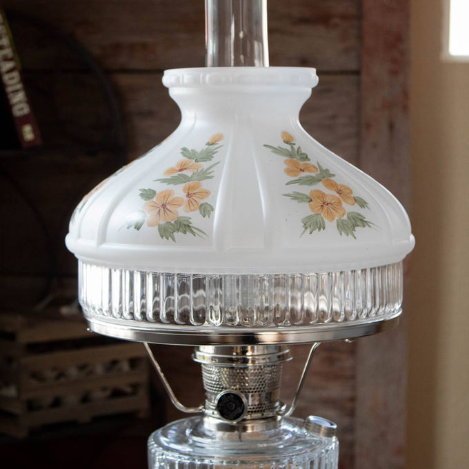 Hand-molded glass lamp shade decorated with soft yellow buttercup flowers and green leaves, designed for Aladdin 10-inch shade rings in Lamps & Lighting, Lamp Shades, and Best Sellers collections.