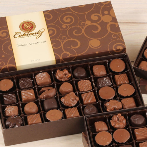 Assorted handcrafted chocolates in an elegant box, made in USA, perfect for Kitchen & Food, Snacks and Sweets, Candy, and Best Sellers collections.