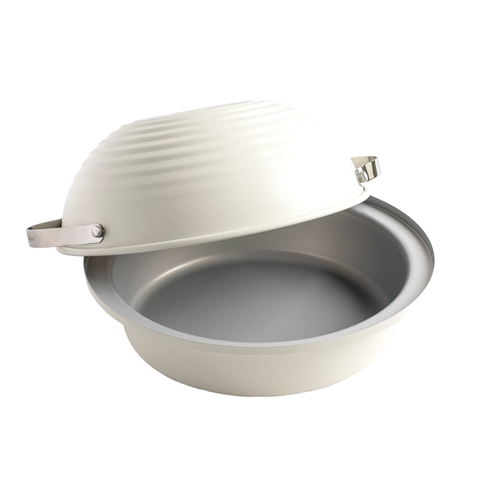 Cream-colored round baking cloche with a hinged domed lid and metal clasp, designed for home bread making and included in Kitchen & Food and Baking Supplies collections.