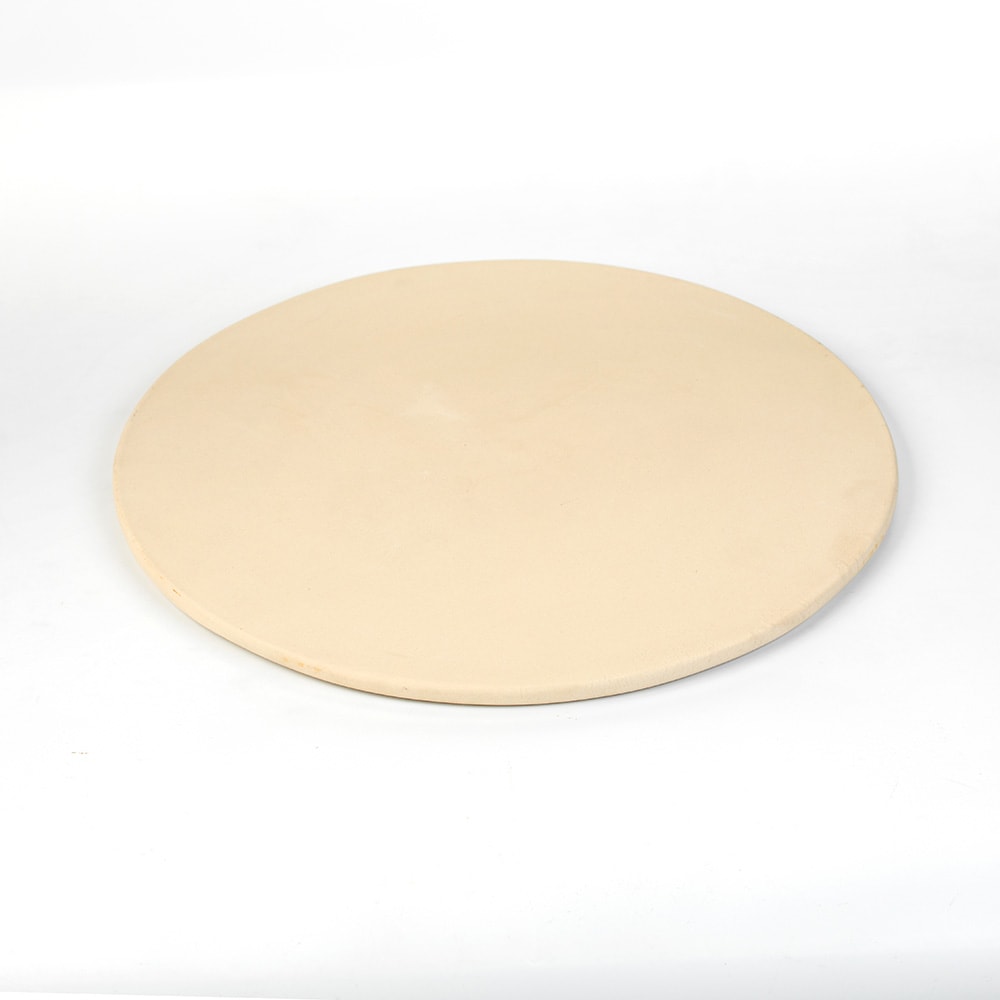 Round natural stoneware pizza baking stone in light beige, handcrafted in USA, designed for even heat distribution and healthier cooking, featured in Kitchen & Food, Cookware, Pots and Pans, USA Made, Best Sellers, and New collections.