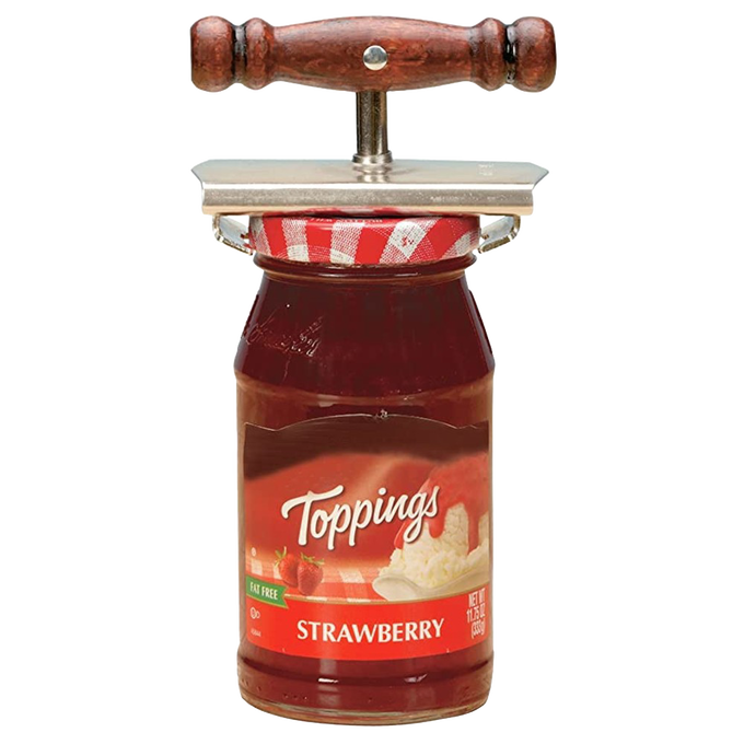 Twister jar opener with chromed steel jaws and wooden handle clamped on a strawberry jam jar, designed to ease opening tight lids for those with limited hand mobility, featured in Kitchen Gadgets and Best Sellers collections.