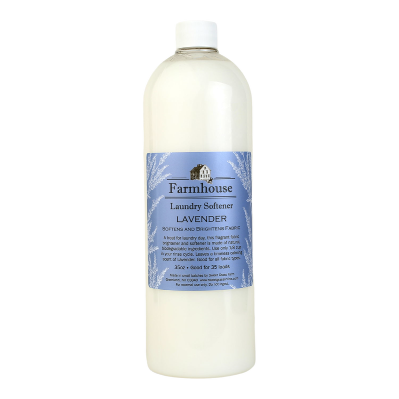 Tall bottle of handcrafted lavender-scented fabric softener made in USA small batches, designed to soften and brighten fabrics gently, ideal for Home & Decor and Laundry Supplies collections.