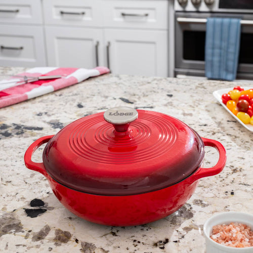 Handcrafted red enameled cast iron 3-quart Dutch oven with glossy finish and metal knob, perfect for broiling, braising, baking, or roasting, featured in Kitchen & Food, Cookware, Cast Iron, Best Sellers, Bread Making Supplies, and Promo Eligible collections.