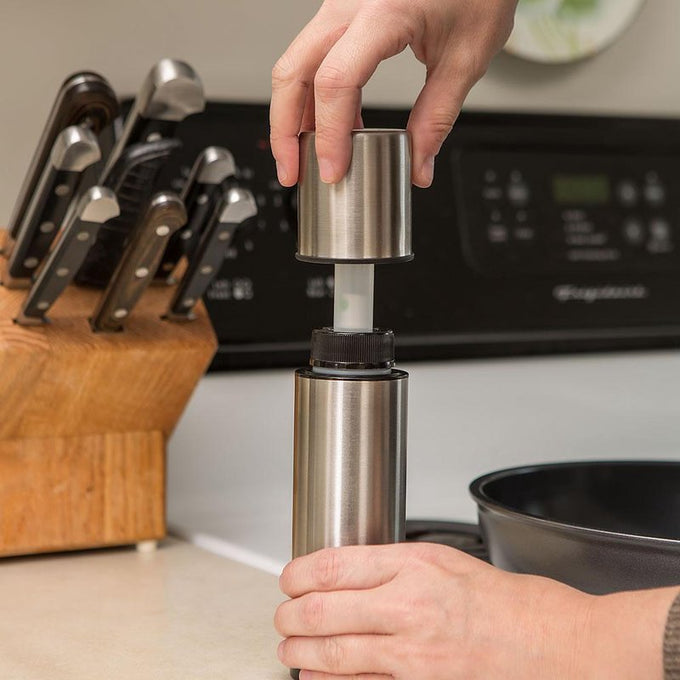 Handheld stainless steel non-aerosol mister with 8 oz capacity, ideal for adding oils or spritzing liquids in Kitchen & Food, Cookware, Baking Supplies, Kitchen Gadgets, and Best Sellers collections.