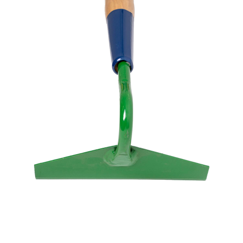 Green steel blade of a handcrafted garden hoe with a sharp edge and wooden handle, designed for weeding and soil cultivation in farm and garden settings.
