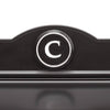 Close-up of a handcrafted black and white custom wall mount mailbox featuring a raised circular monogram letter "C," designed to enhance curb appeal in Home & Decor and USA Made collections.