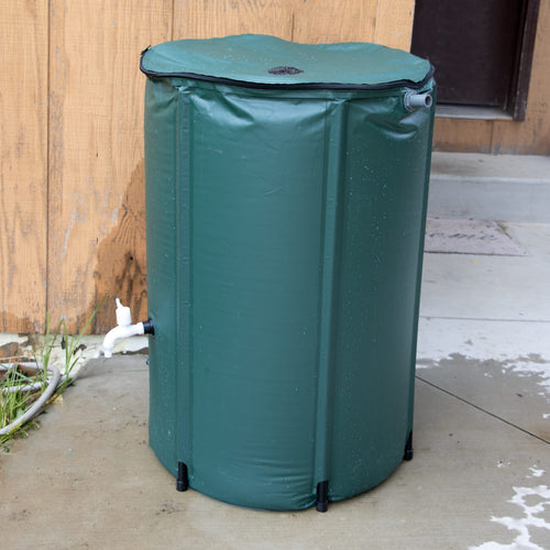Green collapsible rain barrel with attached white spigot and overflow valve, designed for easy water collection in farm, garden, and lawncare settings, featured in best sellers.
