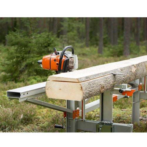 Portable orange and silver chainsaw mounted on a metal frame cutting a large log into lumber outdoors, designed for Farm, Garden & Tool, Wood Cutting and Hauling, and Best Sellers collections.