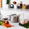 Handmade stainless steel 5-quart sauce pot with lid, featuring durable fully clad construction, displayed on a kitchen countertop with fresh vegetables and poultry, ideal for Kitchen & Food, Cookware, Pots and Pans, and Best Sellers collections.