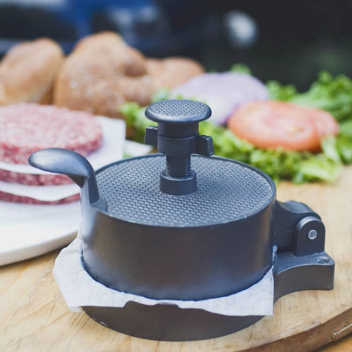Black metal single hamburger press with adjustable thickness knob and handle, designed for consistent patty size, featured in Kitchen & Food, Specialty Equipment, Butchering Supplies, and Best Sellers collections.