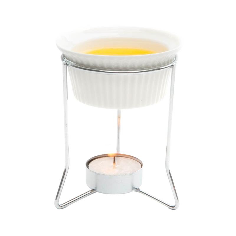 Ceramic butter warmer held on a metal stand with a lit tealight below, designed for gentle heating of butter and delicate sauces, featured in Kitchen & Food and Storage collections.